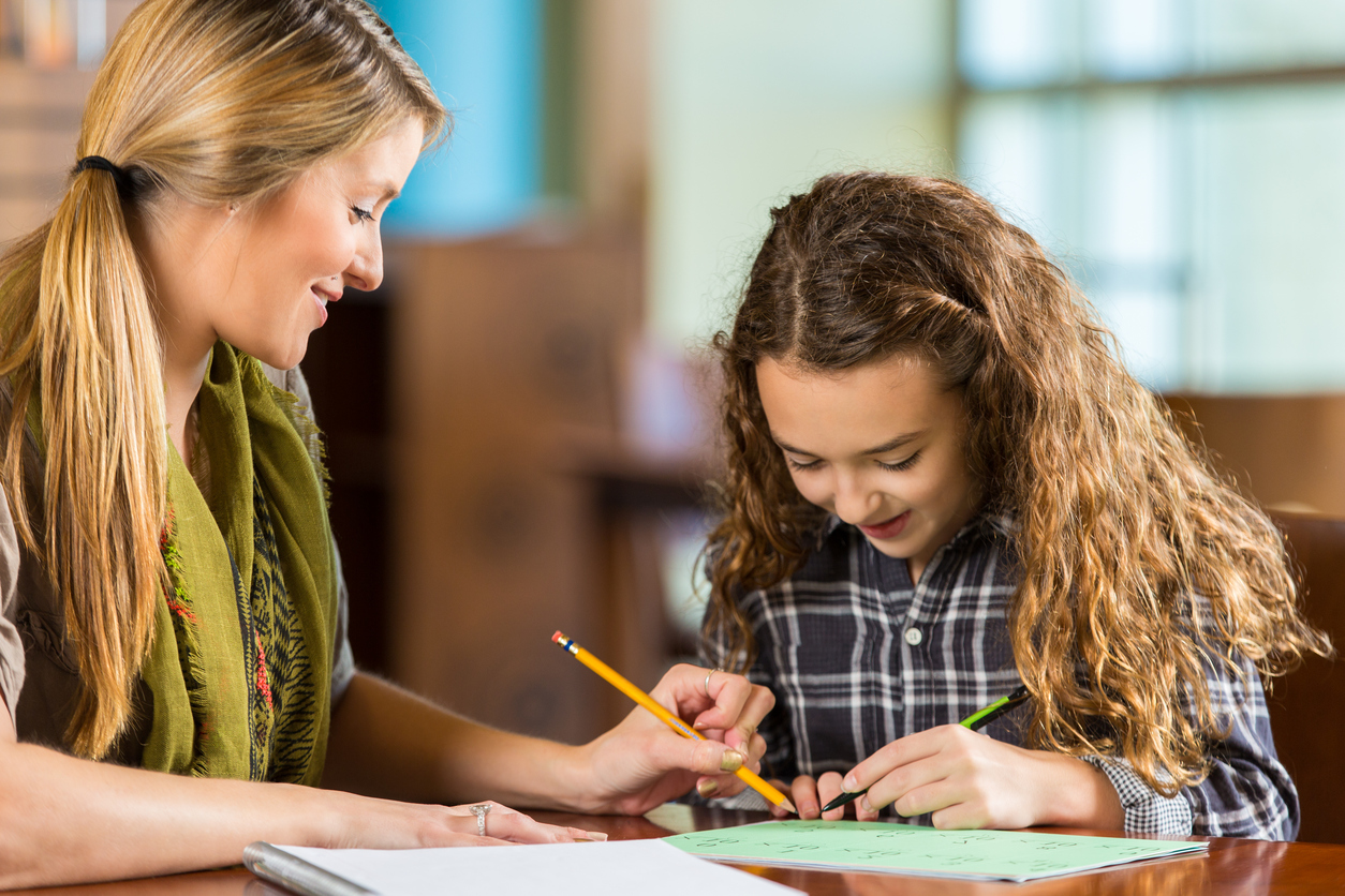 Platinum _ Elementary age girl doing math homework or homeschool assignment iStock_504919296.jpg